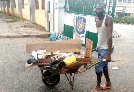  ?? PHOTO: PHILIP OJISUA ?? Cleaning up at Government Secondary School, Garki to admit Senior Secondary School students as schools reopen in Abuja… yesterday.