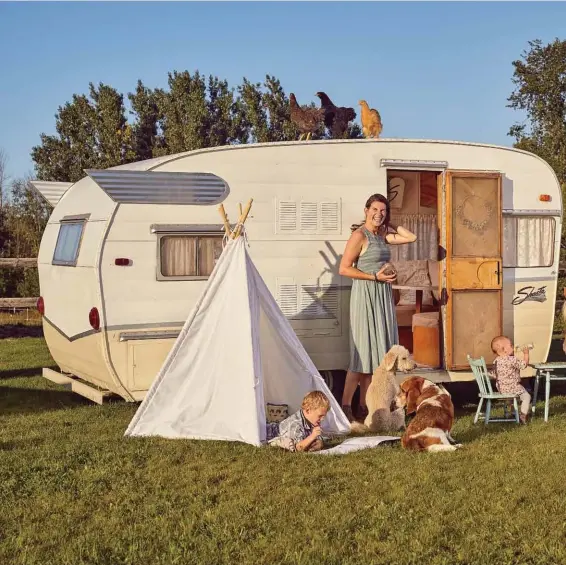  ??  ?? Above: Katie Cleary, son Bentley, and daughter Willa, with their extended family of dogs and chickens and horses