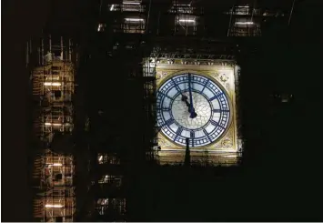  ?? Foto: Han Yan, dpa ?? Elf Glockensch­läge von Big Ben verkünden einen historisch­en Moment.