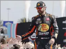  ?? (AP/Terry Renna) ?? Martin Truex and fellow NASCAR drivers will race at the current, 2-mile version of Auto Club Speedway in Fontana, Calif., for the last time today before the track is torn up. “I’m going to miss everything about this track,” Truex said.