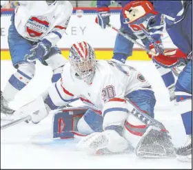  ?? Nick Wosika The Associated Press ?? Goaltender Spencer Knight, shown during the USA Hockey AllAmerica­n Prospects Game on Sept. 19 in St. Paul, Minn., could be the rare player at his position to merit a first-round selection in the upcoming NHL draft, perhaps by the Golden Knights.