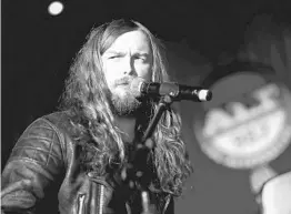  ?? CHRISTOPHE­R POLK/GETTY IMAGES FOR CLEAR CHANNEL ?? J. Roddy Walston and his band the Business, who released “Destroyers of the Soft Life” in September, will perform 7 p.m. Tuesday at The Social in downtown Orlando.