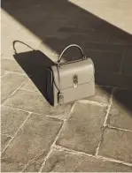  ??  ?? Quintessen­tial Florentine style is found in the BOXYZ bag, available at Salvatore Ferragamo boutiques across Australia and online