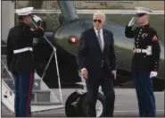  ?? (AP/Manuel Balce Ceneta) ?? President Joe Biden disembarks Marine One Friday upon arrival at the Gordons Pond in Rehoboth Beach, Del.