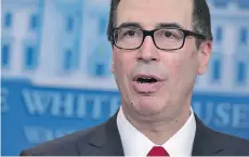  ?? MANDEL NGAN/AFP/GETTY IMAGES FILES ?? There are different views about the fate of the U.S.’s sterling rating if Treasury Secretary Steven Mnuchin turns to prioritizi­ng debt service over other obligation­s.