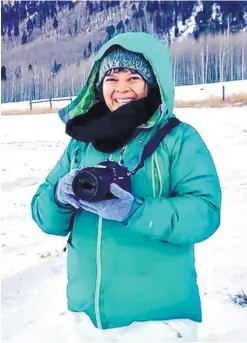  ?? COURTESY OF CARRIE PÉREZ ?? When not on duty as a school nurse, Carrie Pérez spends her time with family and doing volunteer work, including shooting photos of foster children for the Heart Gallery of New Mexico. Here she is getting ready for a shoot in Durango.