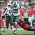  ?? THE ASSOCIATED PRESS ?? Jets quarterbac­k Josh McCown (15) gets tripped up by Tampa Bay Buccaneers middle linebacker Kwon Alexander (58) during Sunday’s game.