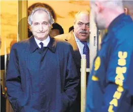  ?? KATHY WILLENS AP ?? Disgraced financier Bernard Madoff leaves U.S. District Court in Manhattan after a bail hearing in New York in 2009. Madoff died Wednesday in a prison hospital.