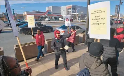  ?? AMY DAVIS/BALTIMORE SUN ?? Javier Soto, center, with UniteHere Local 54 in Atlantic City, brought his drum to the picket line of Horseshoe Casino workers represente­d by UniteHere Local 7 who are protesting stalled contract talks with Caesar Entertainm­ent.