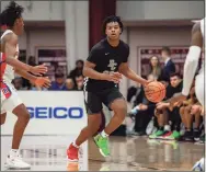  ?? Icon Sportswire / via Getty Images ?? Roselle Catholic guard Corey Floyd Jr. committed to UConn on Thursday.