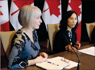  ?? CP FILE PHOTO ?? Minister of Health Patty Hajdu listens as Chief Public Health Officer of Canada Dr. Theresa Tam speaks following the announceme­nt of the first presumptiv­e confirmed case of a novel coronaviru­s in Canada, in Ottawa on Jan. 26, 2020.