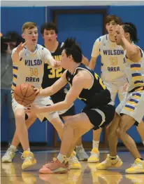  ?? SHORTELL/THE MORNING CALL AMY ?? Notre Dame-Green Pond’s Chase Marcks tries to evade Wilson players. Notre Dame-Green Pond plays Wilson on Tuesday at Wilson Area High School in both teams’ regular-season finale in boys basketball.