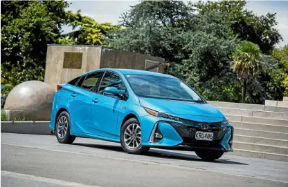  ??  ?? Prius is generally loathed by both car enthusiast­s and electric-vehicle obsessives. You can’t win.