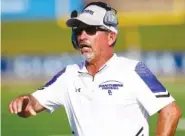  ?? STAFF PHOTO BY ROBIN RUDD ?? Sale Creek football coach Ron Cox reacts to a play during a Times Free Press football jamboree match-up in August 2021 at Finley Stadium.