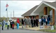  ??  ?? The West Rockhill Township building polling place has a long line out the door at 7 a.m. on Election Day.