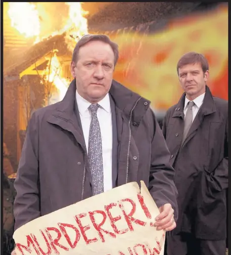  ??  ?? HO HUM: Neil Dudgeon (DCI Barnaby) and Jason Hughes (DS Jones) have laughable plots to deal with in Midsomer