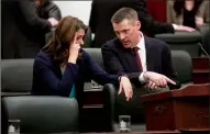  ?? CP FILE PHOTO ?? Premier Danielle Smith and Finance Minister Nate Horner speak before Horner delivers the 2024 budget in Edmonton on Feb. 29. The Alberta government is publicly offering a 7.5-percent wage increase in the midst of collective bargaining, with government workers calling for a 26-per-cent bump.