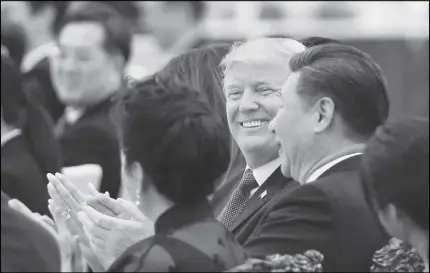  ?? AP PHOTO ?? U.S. President Donald Trump and China’s President Xi Jinping attend at a state dinner at the Great Hall of the People in Beijing, China.