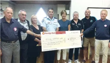  ??  ?? Yarragon Lions Club member Roy Robins (left) and president Tony Hayes present cheques to Russell Wheatley (bowls), Jackie van de Burgt (primary school), Geoff Conway (fire brigade), Ange Bayley (tennis club), Tony Harvey-Hall (senior football) and...