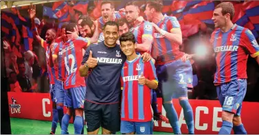  ??  ?? Dhruvmil Pandya with Crystal Palace Football Club Ambassador and former player, Mark Bright.