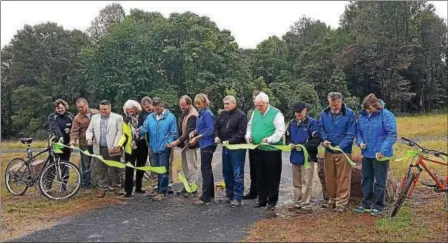  ?? MARIAN DENNIS – DIGITAL FIRST MEDIA ?? The ribbon-cutting for the French Creek State Park phase of the Big Woods Trail took place on Friday near the Berks-Chester county line. Bureau of State Parks officials and many others attended the opening.