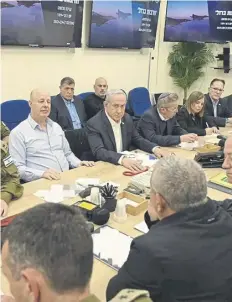  ?? PICTURE: ISRAELI PRIME MINISTER OFFICE/AFP ?? Benjamin Netanyahu, centre, chairs a war cabinet meeting in Tel Aviv as Israel faces growing calls to de-escalate the crisis