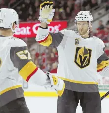  ?? AP PHOTO ?? TOO GOOD: Colin Miller celebrates his goal with David Perron during the Golden Knights’ win last night.