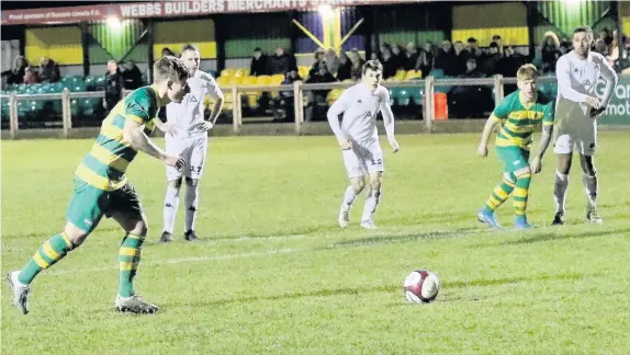  ?? Pictures: Andy Findlay ?? Louis Corrigan takes his stoppage-time penalty, scoring the winner on the rebound