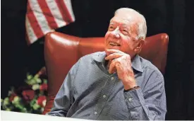  ?? ELI HILLER/COLUMBUS DISPATCH FILE ?? Festivitie­s originally scheduled for Sunday, former President Jimmy Carter’s 99th birthday, will now be held Saturday at the Jimmy Carter Library & Museum and adjacent Carter Center in Atlanta.