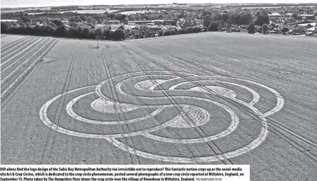  ?? THE HAMPSHIRE FLYER ?? DID aliens find the logo design of the Subic Bay Metropolit­an Authority too irresistib­le not to reproduce? This fantastic notion crops up as the social-media site Art & Crop Circles, which is dedicated to the crop circle phenomenon, posted several photograph­s of a new crop circle reported at Wiltshire, England, on September 13. Photo taken by The Hampshire Flyer shows the crop circle near the village of Roundway in Wiltshire, England.