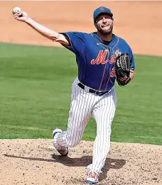  ?? ?? New York Mets starting pitcher Max Scherzer throws during the third inning of a spring training baseball game against the Washington Nationals on Friday in Port St. Lucie, Fla. (AP Photo/Lynne Sladky)