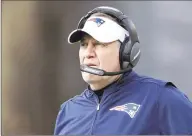  ?? Elise Amendola / Associated Press ?? Patriots coach Bill Belichick is being coy about his expectatio­ns for the quarterbac­k position as his teams prepares for the start of training camp.