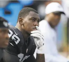  ?? Ben Margot / Associated Press 2015 ?? Smith’s stay in Oakland ended after nine games when he was suspended for violating the NFL’s substancea­buse policy.