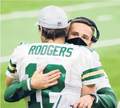 ?? REYDELRIO/GETTY ?? Packers quarterbac­kAaronRodg­ers and coach Matt LaFleur are thriving in their second season together.