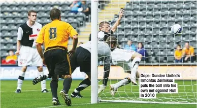  ??  ?? Oops: Dundee United’s Irmantas Zelmikas puts the ball into his own net against Hull in 2010