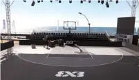  ?? (Elad Mintz) ?? THE TEL AVIV PORT created a sea-side basketball court for this weekend’s FIBA 3x3 Europe Cup qualifying tournament.