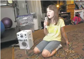  ?? GEORGE SAKKESTAD/STAFF ?? Audrey Walker, 9-year-old fourth grader at Country Lane Elementary School, has defied the odds that doctors gave her parents when she was born with no eyes and several severe heart conditions. She recently sang the national anthem at Levi’s Stadium.