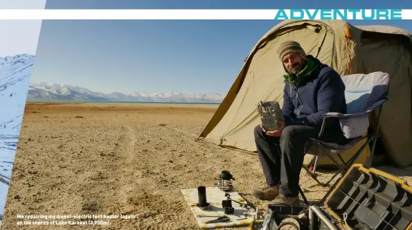  ??  ?? Me repairing my diesel-electric tent heater (again!) on the shores of Lake Karakul (3,900m).