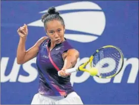  ?? AFP ?? Canada's Leylah Fernandez hits a return against Germany's Angelique Kerber during their 2021 US Open women's singles fourth round match in New York, on Sunday.