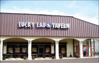  ?? Photos by Karen Degnan Parks ?? The Lucky Lab Tavern is located at 312 North Lewis Road in Royersford, with parking available in both the front and back of the building.