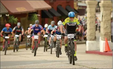  ?? NWA Democrat-Gazette/BEN GOFF • @NWABENGOFF ?? Andrew Files (1045) of Little Rock leads his heat in the men’s category 3 race off of the starting line July 16 from Basin Park in downtown Eureka Springs before making their way onto the singletrac­k at Lake Leatherwoo­d City Park during cross country...