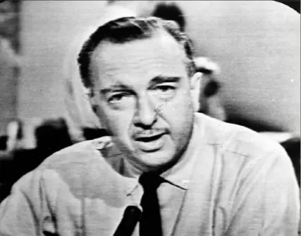  ?? Post-Gazette archive ?? Walter Cronkite announces the death of President John F. Kennedy, as seen from a television monitor on Nov. 22, 1963. The assassinat­ion marked the first time that television networks stayed on the air live for days.