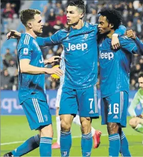  ?? FOTO: AP ?? En su partido 1.000 Cristiano Ronaldo celebra su gol junto a Ramsey y Cuadrado