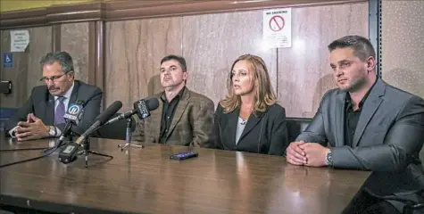  ?? Michael M. Santiago/Post-Gazette ?? The family of Alina Sheykhet, who was found dead in October 2017 in her Oakland apartment, prepares to speak to the media Wednesday at the Allegheny County Courthouse, Downtown, after the sentencing of Matthew Darby, who pleaded guilty of her murder.