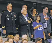  ?? MICHAEL CONROY/THE ASSOCIATED PRESS ?? Vice President Mike Pence, front center, stands Sunday during the playing of the national anthem before a game between the Indianapol­is Colts and the San Francisco 49ers in Indianapol­is.