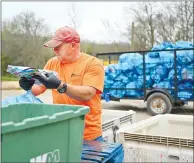  ?? Caleb Grieger/NWA Democrat Gazette ?? Boston Mountain Solid Waste District is running a trial program with rural workers in an effort to increase the amount of recycling in the community.