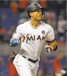  ?? Patrick Farrell / Miami Herald ?? The Marlins’ Giancarlo Stanton is a prize catch being lured by many teams, with the Giants among those trying to land him.