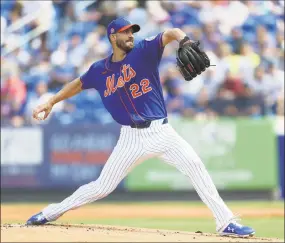  ?? Vera Nieuwenhui­s / Associated Press ?? The New York Mets’ Rick Porcello pitches during a spring training game against the Miami Marlins on Saturday.