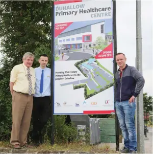  ??  ?? Councillor Gerard Murphy, Ollie Dugdale, chairman of Newmarket Community Developmen­t Associatio­n, and Adrian Brady, secretary, pictured at the entrance to the site of the Duhallow Primary Healthcare Centre which is set to open in the autumn of 2018....