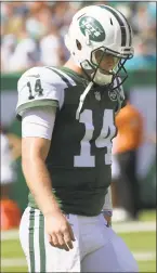  ?? Bill Kostroun / Associated Press ?? After starting the season with a strong performanc­e in a win over the Lions, Jets quarterbac­k Sam Darnold came back to earth a bit in Sunday’s loss to the Dolphins.